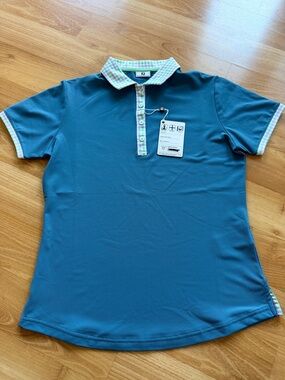 FootJoy NWT women’s golf polo with gingham / plaid trim size small in teal